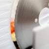 Nærbillede af skiveskiven på en elektrisk kniv Eldom KR100 SNIS.