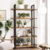 Industriel bogreol med 5 hylder og planter i stue.