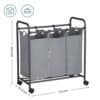 Vaskerimaskine med 3 aftagelige poser og hjul, sort, robust design.