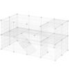 Hvid metal pet playpen med flere sektioner og rampe til små dyr.