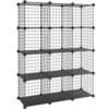 Sort wire grid opbevaringsreol med hylder og netpaneler.