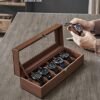 Songmics Watch Box med 6 slots, urkasse med glaslåg, fløjlsurpuder, urholder med lås, 11,2 x 30 x 8 cm, gaveide, brun syntetisk læder, brun foring JWB006K01 - Billede 3