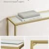 Moderne glas- og metalbord med guldfinish til indretning.