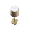 Trådløs bordlampe i guld til indendørs og udendørs brug.