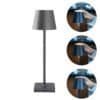 Trådløs bordlampe i antracit med dæmpbar funktion.