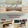 Højdejusterbart skrivebord med justerbar monitorarm og opbevaringshylder.