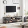 Moderne TV-stander i sort metalramme med opbevaringshylder.