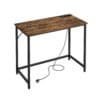 VINTAGE Brown-Black computer desk with power strip and cable management.