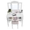 Hvid Vasagle makeup bord med spejl og makeup produkter.