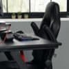 Sort ergonomisk kontorstol med højdejustering og komfortabel rygstøtte.
